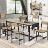 Chaises industrielles en métal noir et bois