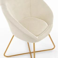 Fauteuil rond en velours beige avec pieds croisés dorés