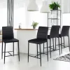 Lot de 4 tabourets de bar en PVC noir rembourrés