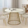 Table à manger ronde 6 personnes pied filaire laiton et plateau effet marbre blanc 110 cm