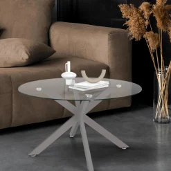 Table basse ronde avec plateau verre et pied acier effet chromé