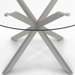 Table basse ronde avec plateau verre et pied acier effet chromé