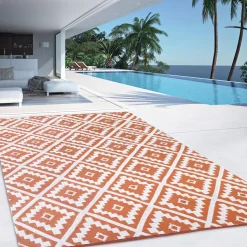 Tapis extérieur terracotta et blanc motifs géométriques 180 x 280 cm