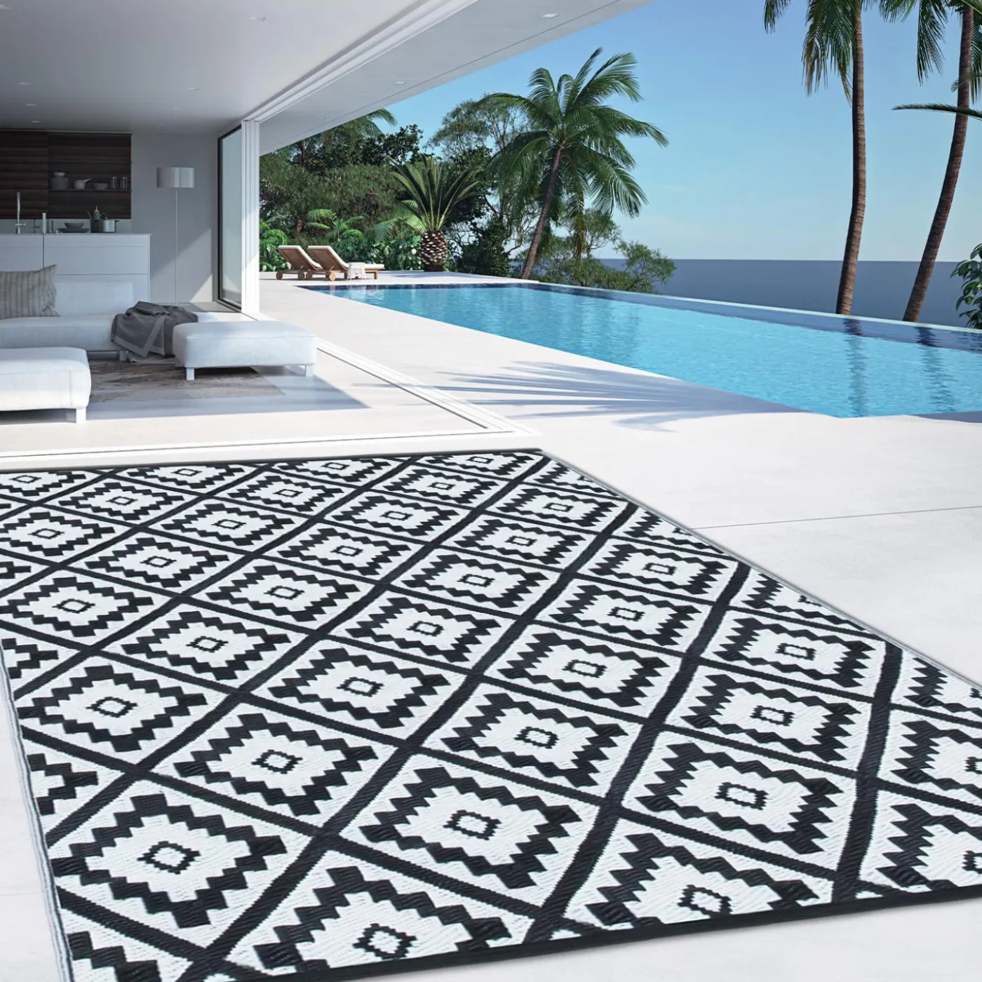 Tapis extérieur terrasse motifs géométriques noir et blanc 160 x 260 cm
